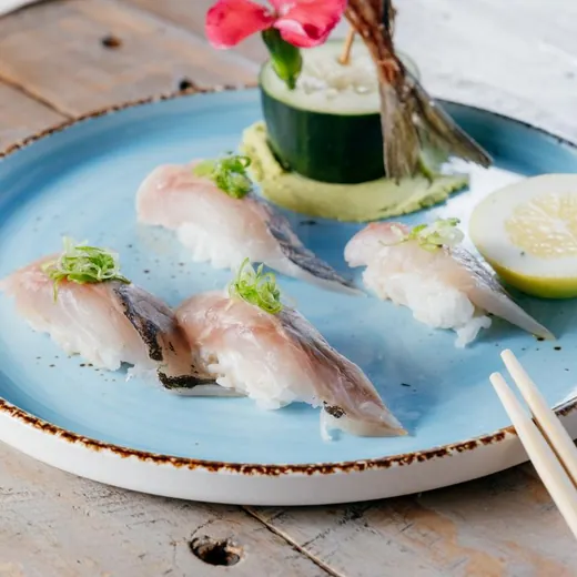 Nigiri on a blue plate