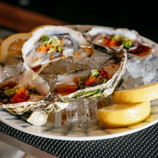 Oysters on ice with lemon